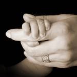 Baby And Adult Hand I by Tanya Hovey