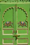Elephants painted on green door, City Palace, Udaipur, India by Adam Jones / Danita Delimont