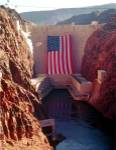 Hoover Dam with large  American flag