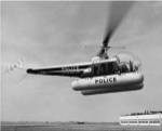 Low angle view of a helicopter in flight, Bell 47-D, Bell Aircraft Corporation
