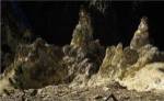 Rock formations at a canyon, Grand Canyon of the Yellowstone, Yellowstone River, Yellowstone National Park, Wyoming, USA