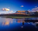 Sofa Mountain in Beaver Pond, Waterton Lakes NP, Alberta by Chuck Haney / Danita Delimont