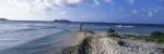 Tourist fishing on the beach, Sandy Cay, Carriacou, Grenada by Panoramic Images