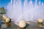 USA, California, Stockton, Weber Point Events Center, Rainbow created by water splashing from fountain