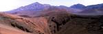 Volcanic landscape with mountains in the background, Haleakala National Park, Maui, Hawaii, USA by Panoramic Images