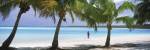 Woman in sarong on the beach, One Foot Island, Aitutaki, Cook Islands by Panoramic Images