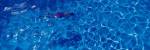 Woman in swimming pool by Panoramic Images