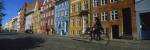 Woman Riding A Bicycle, Copenhagen, Denmark by Panoramic Images