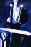 Young man playing the drums